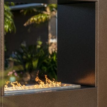 The Outdoor Plus Williams Fireplace Copper Vein Lifestyle Closeup of Flames