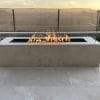 The Outdoor Plus Cabo Linear Fire Pit by the pool