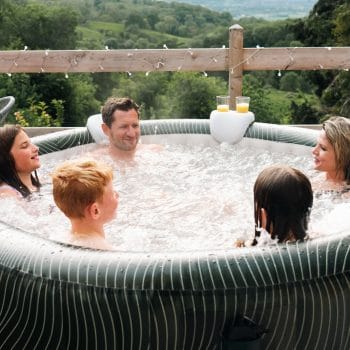 MSPA COMFORT METEOR Hot Tub Round Bubble Spa (6 Bathers) family of 5 enjoying the hot tub