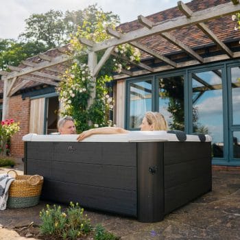 MSpa Frame Series Oslo Hot tub lifestyle photo in backyard
