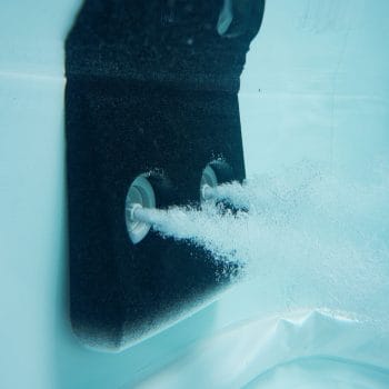 MSpa Frame Series Oslo Hot tub lifestyle photo in backyard with jets